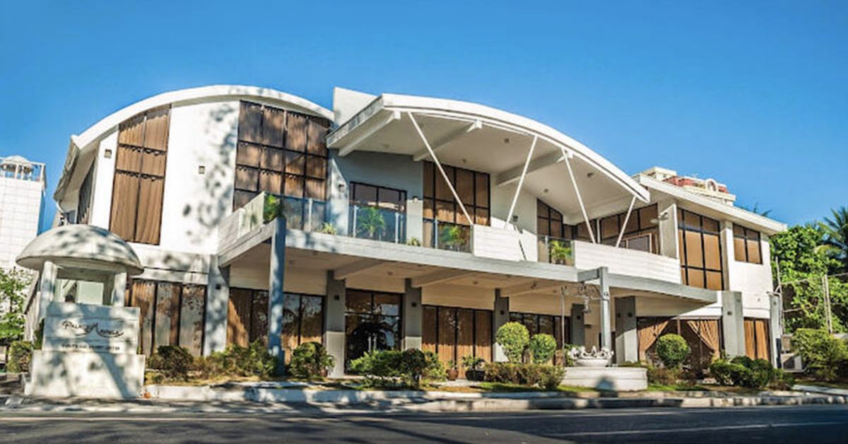 An elegant landmark, harmonizing classic and contemporary architecture, set against a picturesque cityscape  located along the strip of Roxas Boulevard.