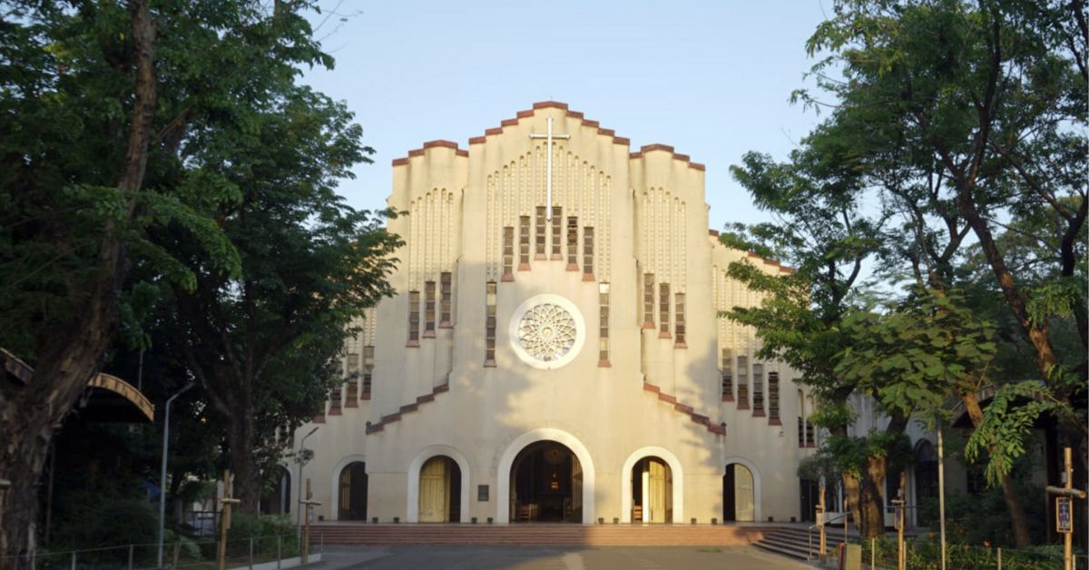 Iconic Baclaran Church, a place of worship and pilgrimage, adorned with intricate architecture and surrounded by a devout atmosphere located along the strip of Roxas Boulevard.