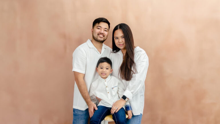A happy family of Erick Afable smiling together.