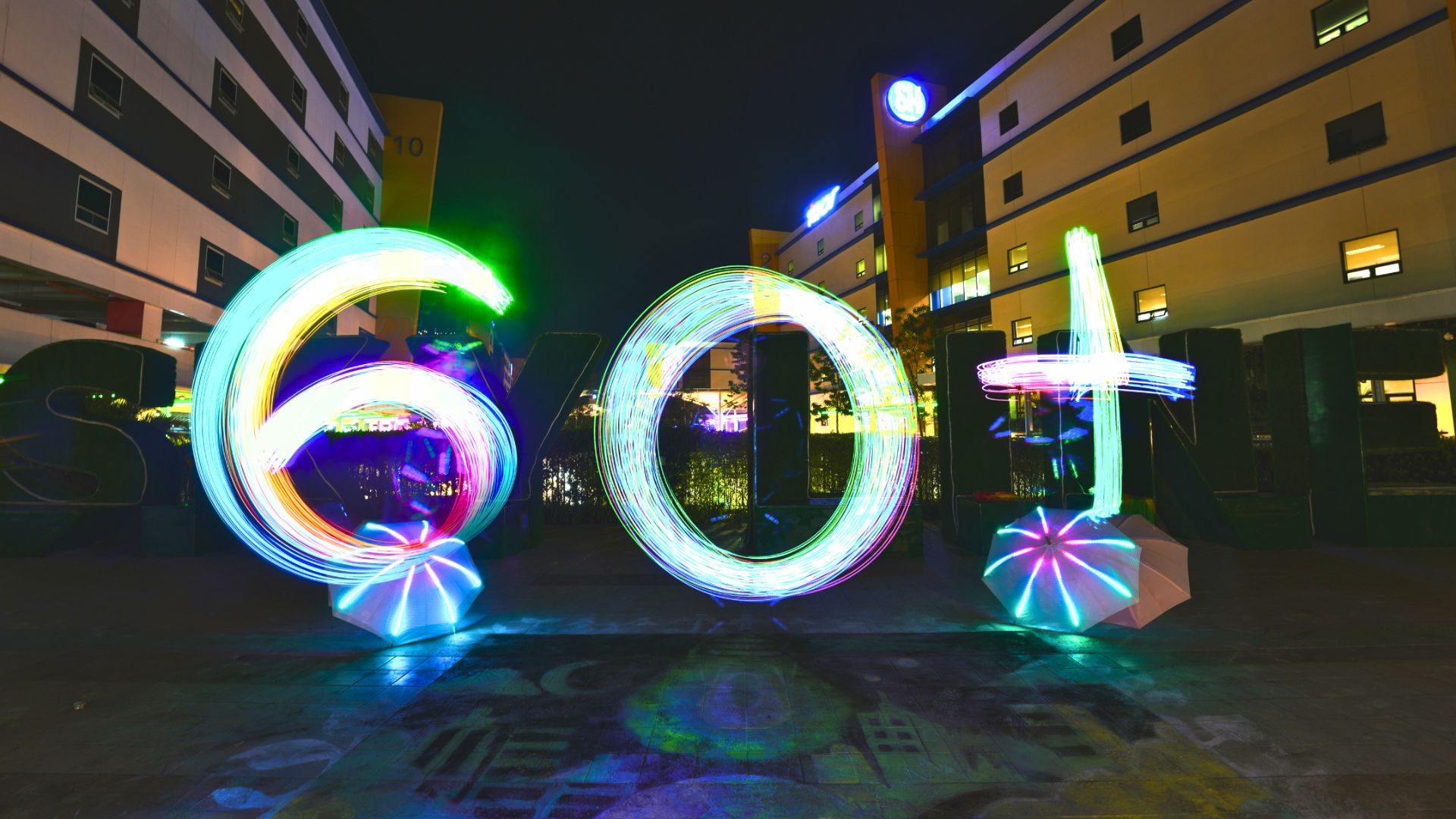 An electrifying LED dance performance showing the 60+ Earth Hour symbol lights up SM City Clark, emphasizing a broader commitment to environmental protection.