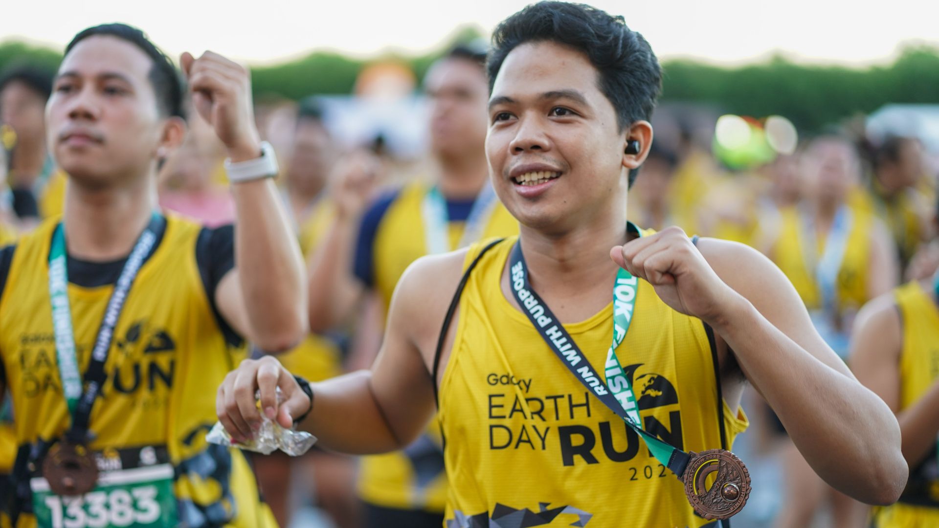 With endless energy and passion, runners celebrate Earth Day and their commitment to a greener planet with music and dancing.