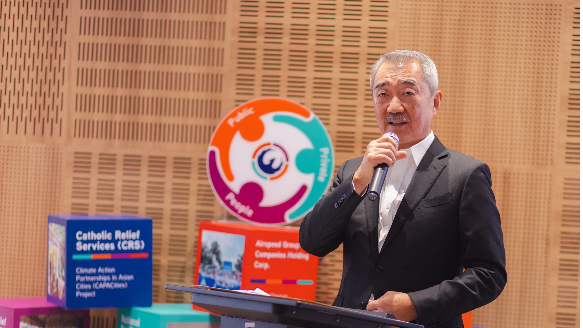 SM Prime Executive Committee Chairman Hans Sy addresses members of ARISE Philippines during the first annual general meeting for 2025. 